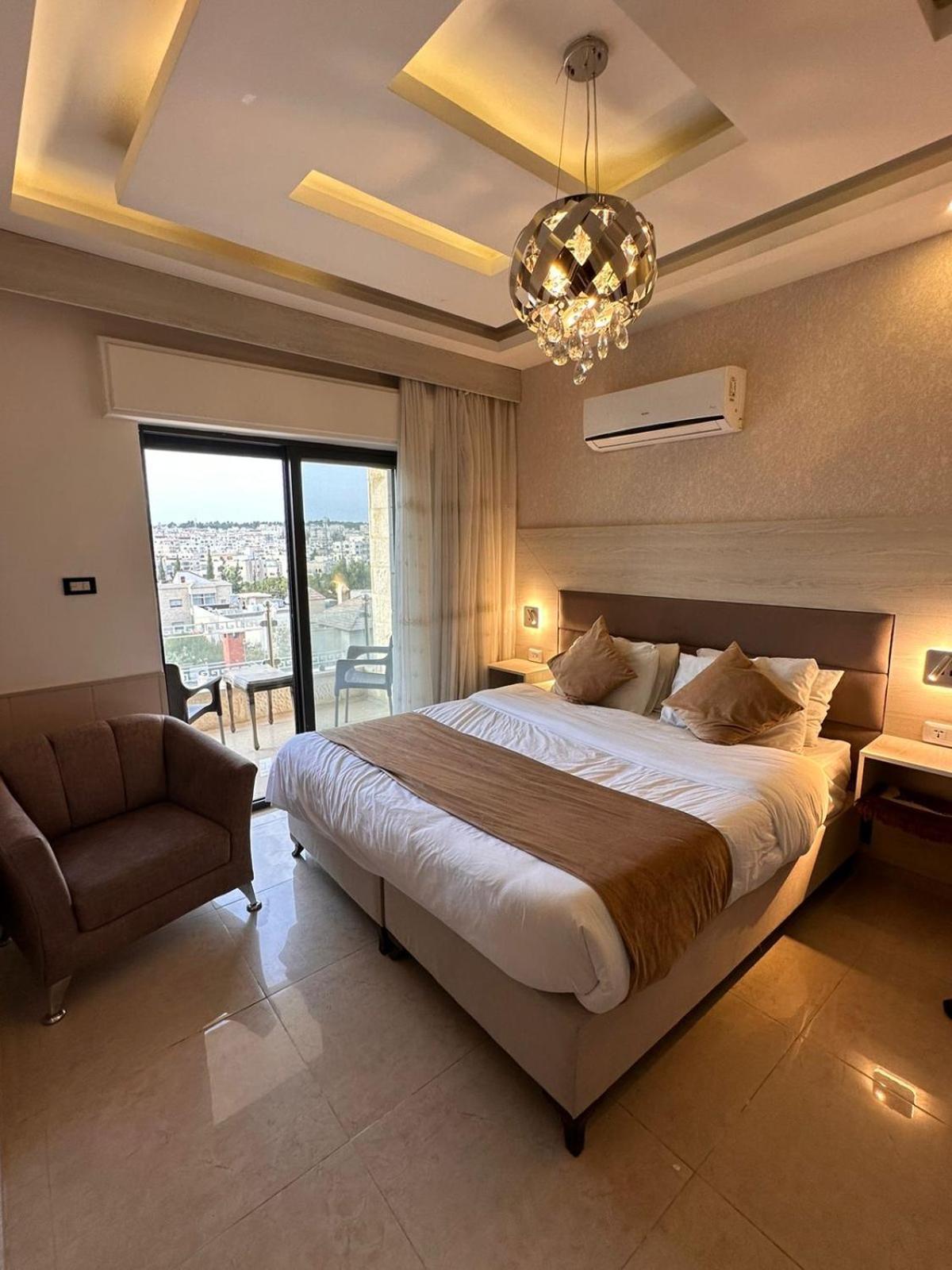 Alqimah Hotel Apartments Amman Buitenkant foto
